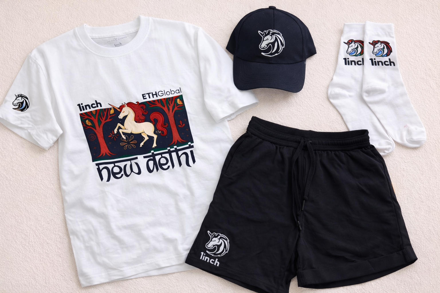 1inch branded merch set flat-lay