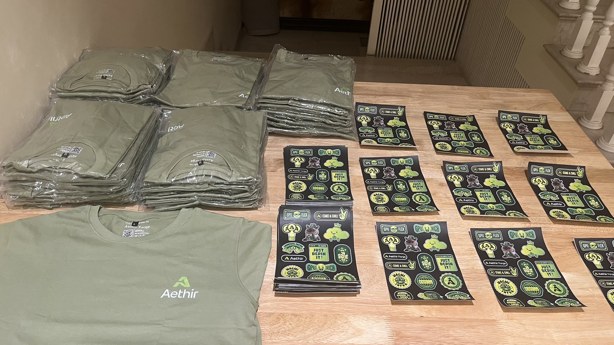 Aethir branded t-shirts and stickers