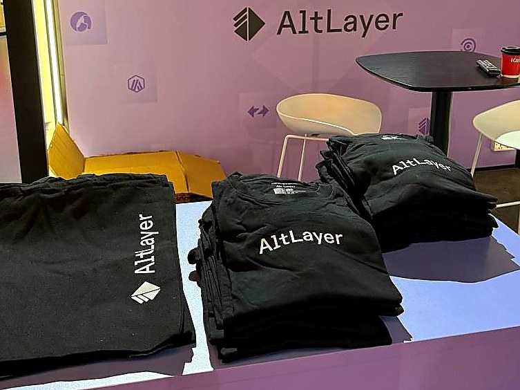 AltLayer branded t-shirts display