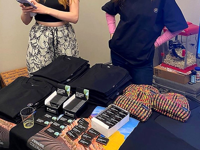 Fluent merch table at event